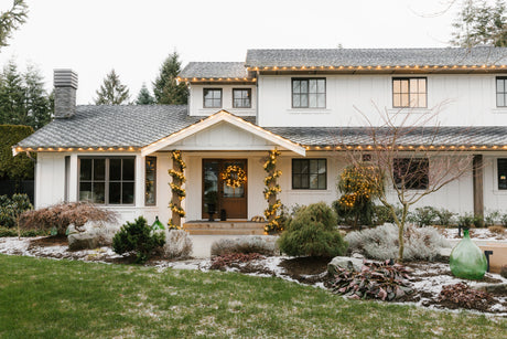 Home decorated with Christmas lights and garlands