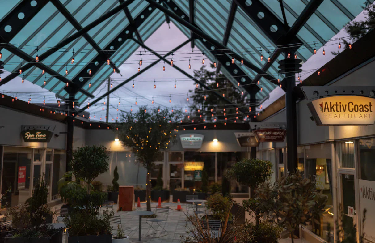 A garden space lit up with Twinkly lights