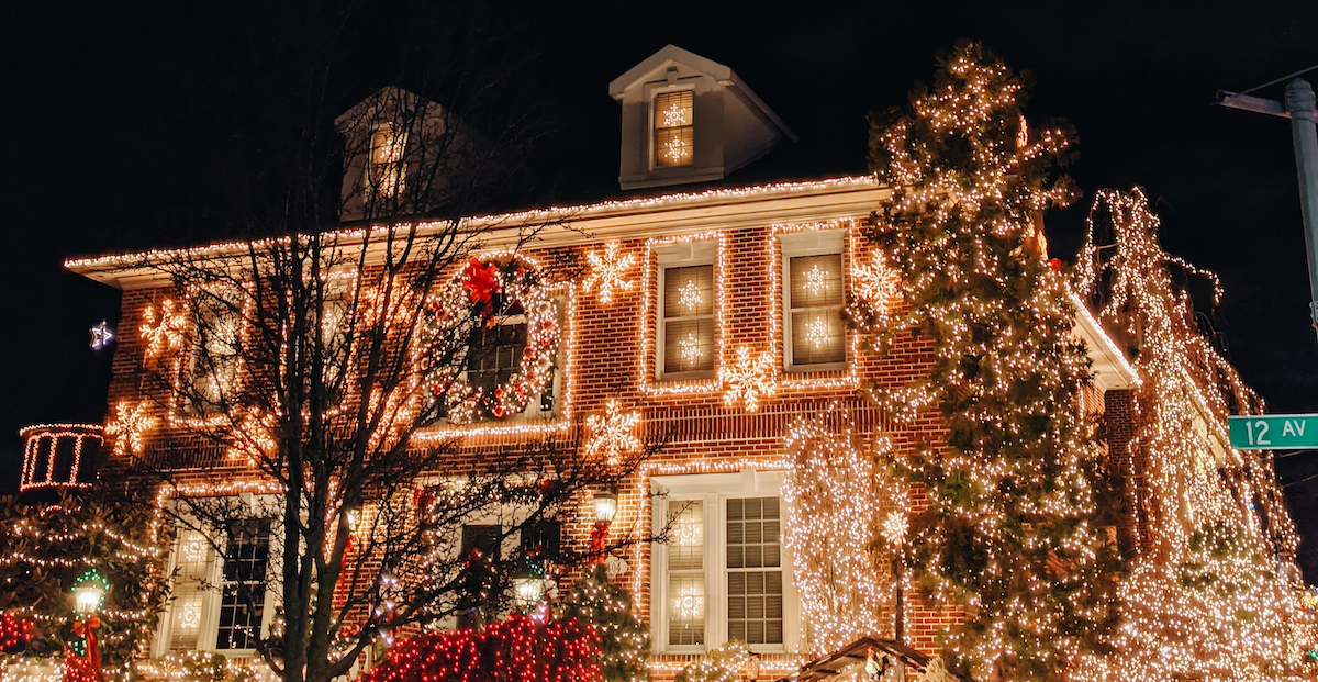 Warm white lights on brick house